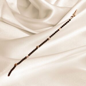 Black beads with Gold skull accents Hair Clip