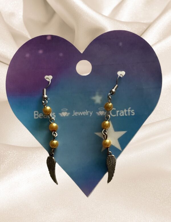 Angel wings with gold beads